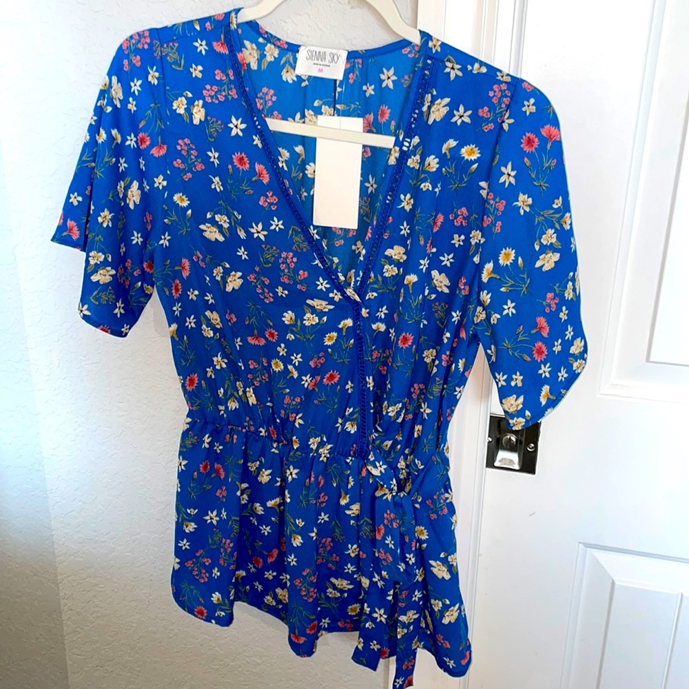 Sienna sky floral wrap blouse size M